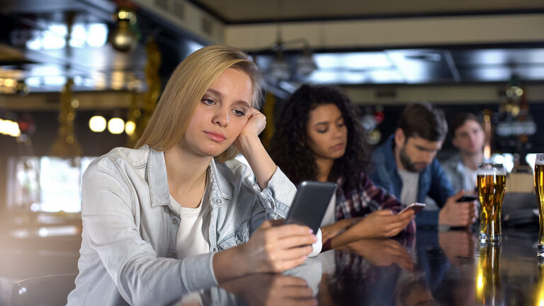 Dating Slang Uncovered: Terms You Need To Know! 1 bigstock Group Of Friends Scrolling Pho 349940176