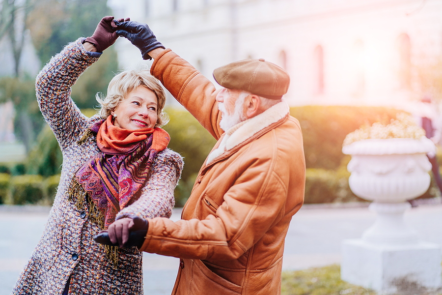 bigstock Happy Old Couple Dancing At Au 336353926