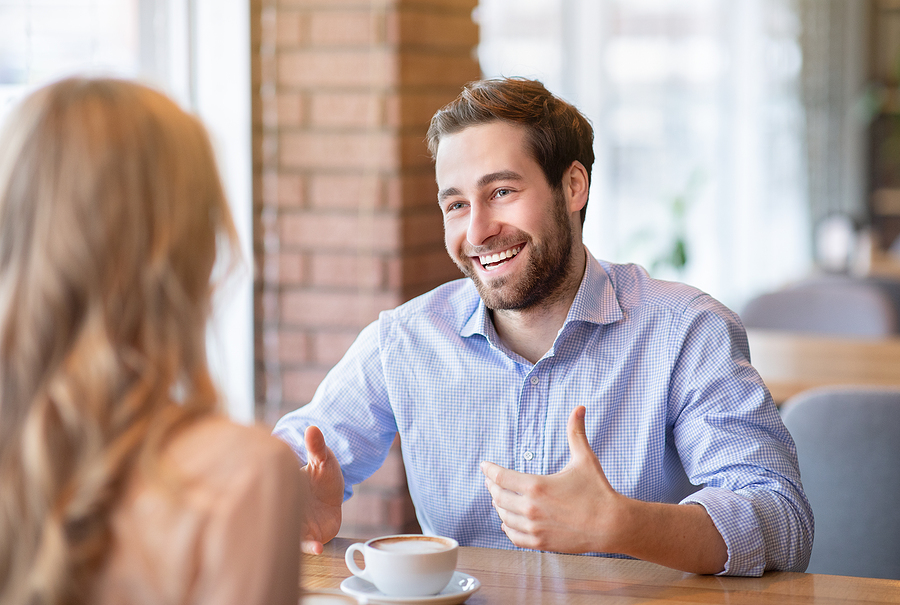 bigstock Happy Young Guy Talking To His 400510736