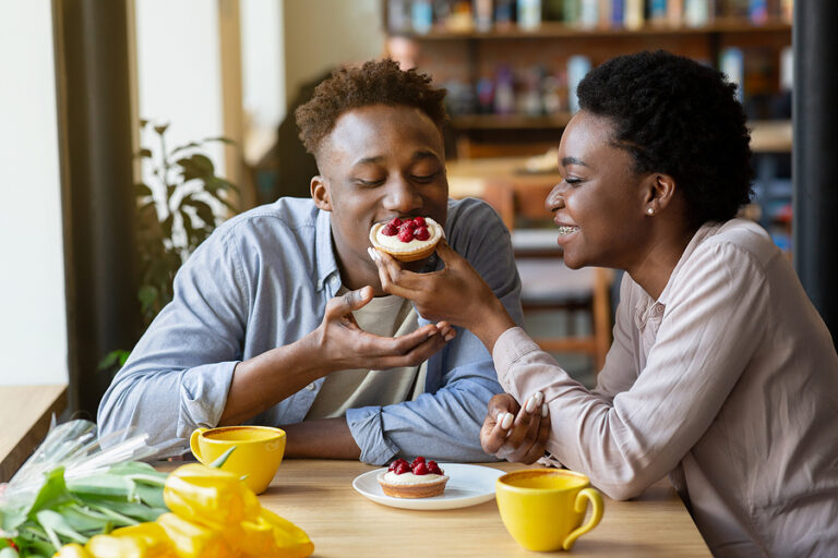 Hard-Ball Dating: What’s It All About? 2 bigstock Lovely Black Woman Feeding Tas 397668272