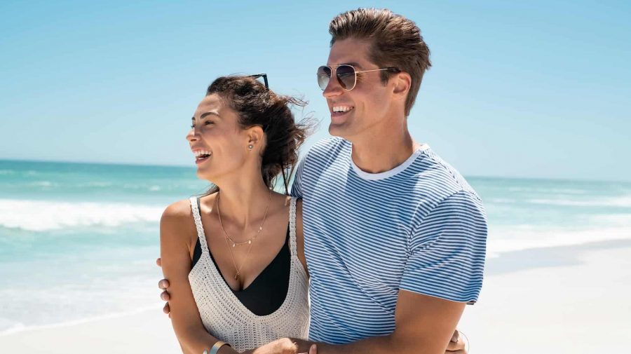 young-couple-embrace-beach young-couple-embrace-beach